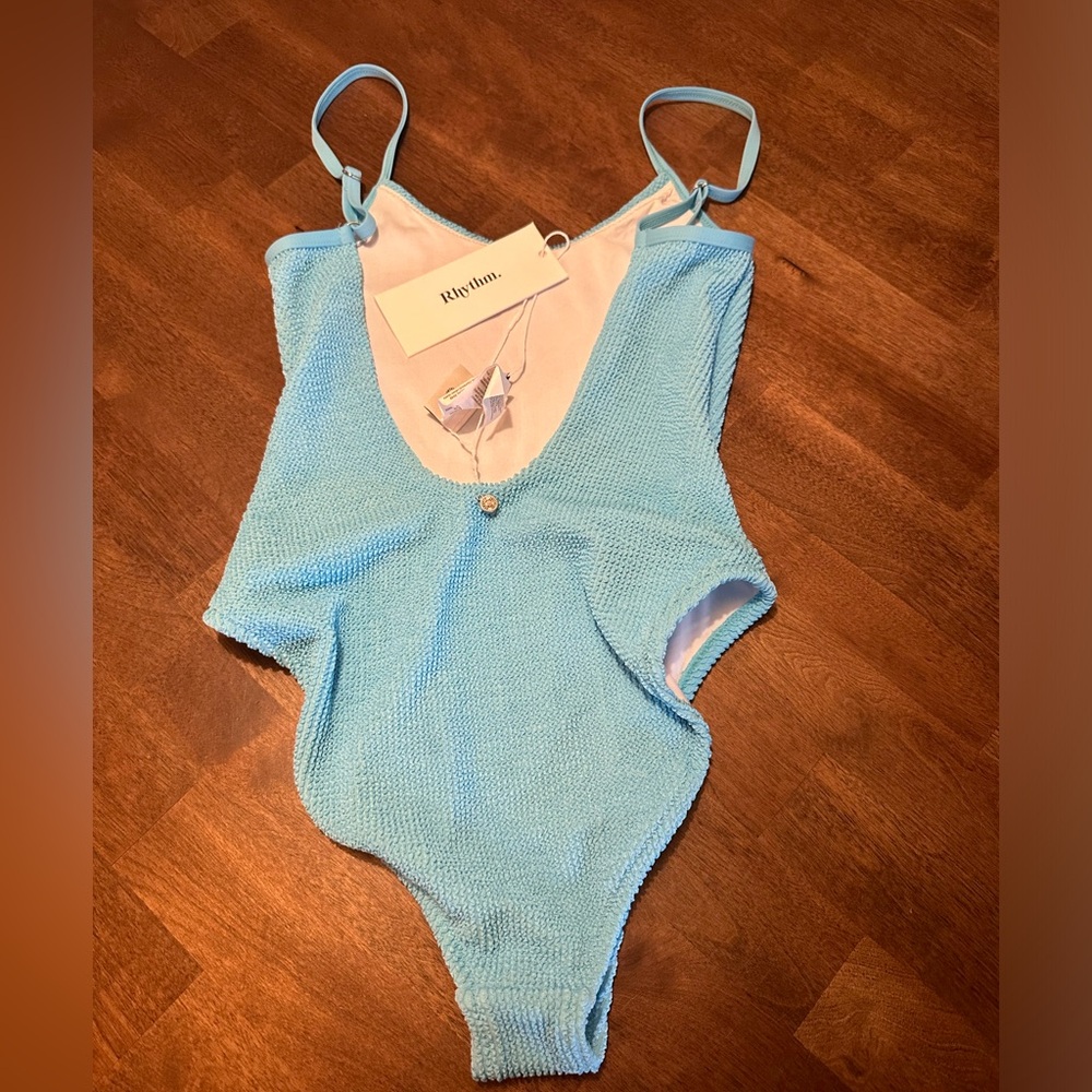 Rhythm. NEVER BEEN USED W/TAGS ON. Wave break minimal one-piece in Sky Blue